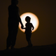 Moon rising in the desert in Dubai, UAE. Image: Tom Dulat/Getty Images